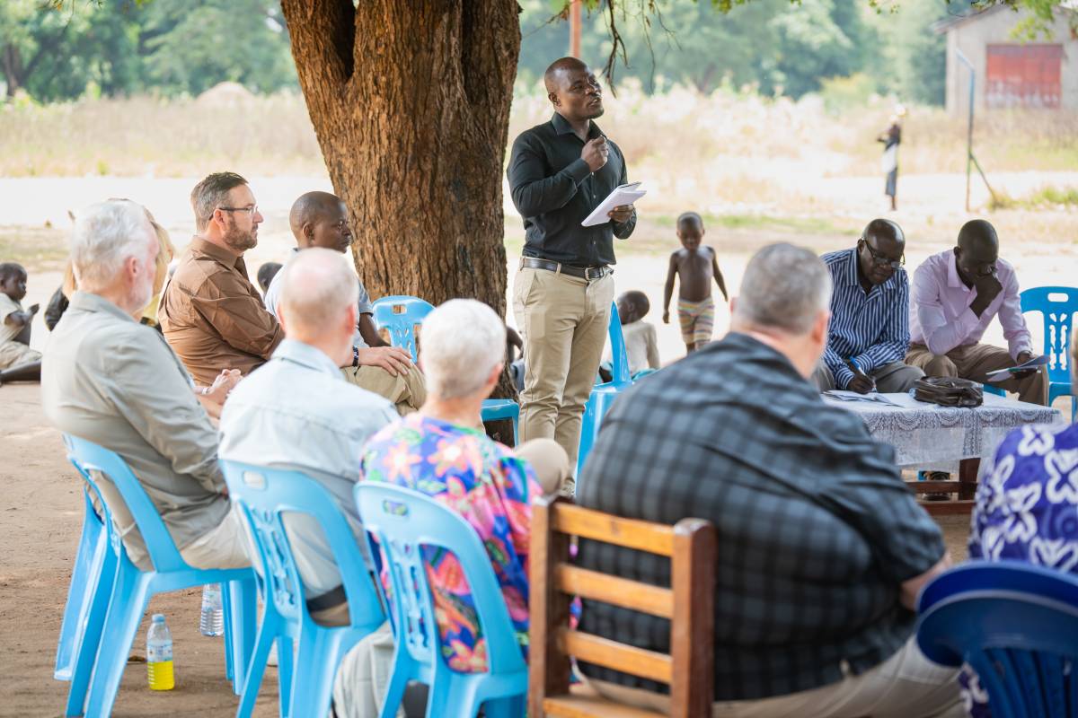 Jonam community in Uganda collaborating on a translation project.